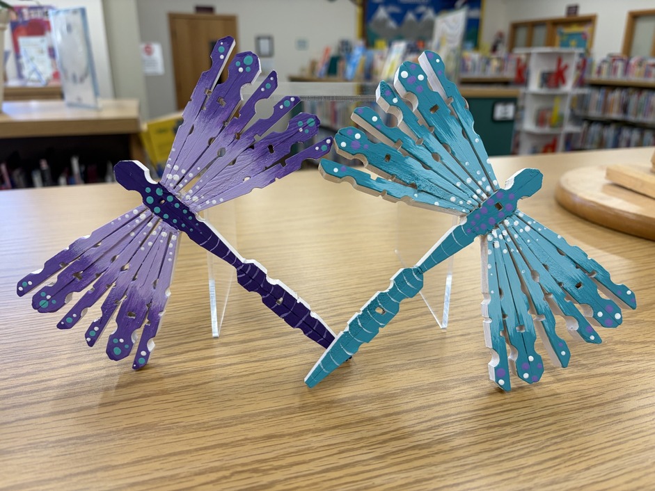 Clothespin Dragonflies craft display on a shelf